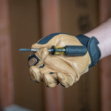 Load image into Gallery viewer, Hand wearing a tan work glove holding a screwdriver with a blurred background